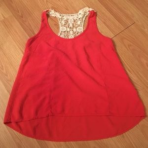 Cute, top with crochet detail on the back.