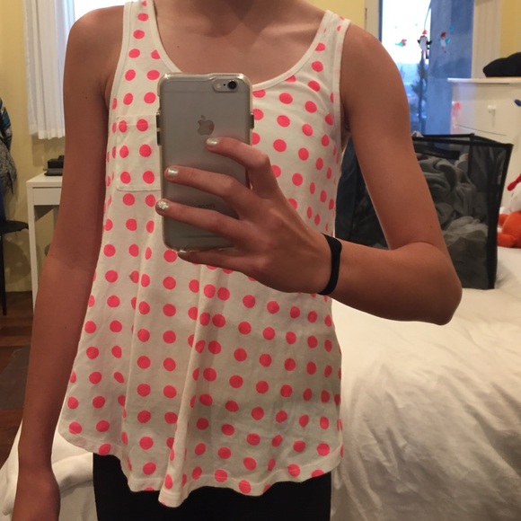 very cite  white tank top with pink poka dots!