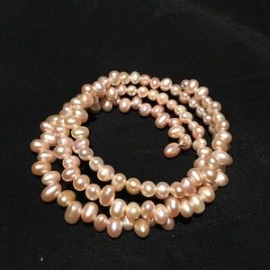 Three strand pale pink mother of pearl bracelet