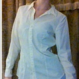 Pale yellow button down long sleeve top