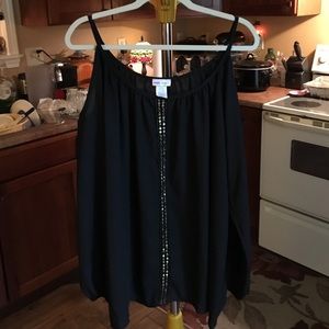 a black blouse with sequins