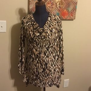 Print blouse with cowl beck and long sides. NWOT