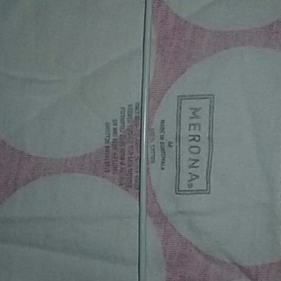 Pink t-shirt with white polka dots throughout - Picture 2 of 3