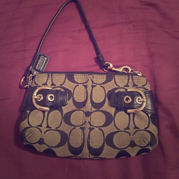 Black and grey Coach wristlet