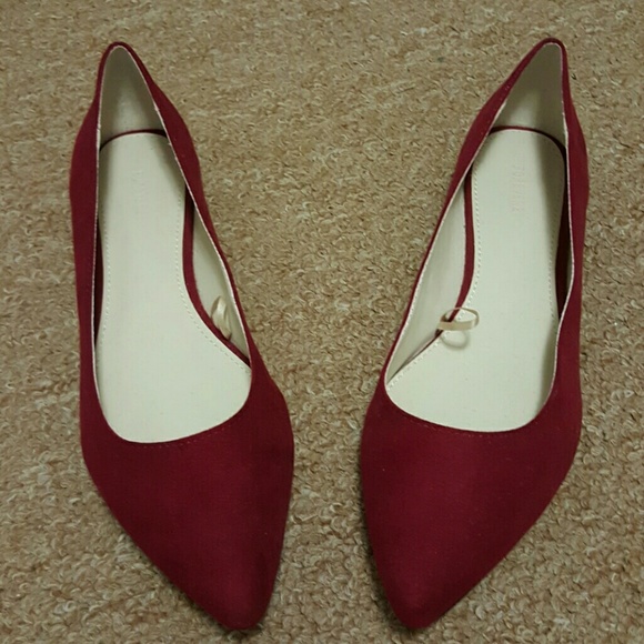 Red pointy flats