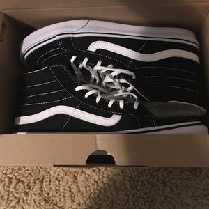 Brand new black and white vans