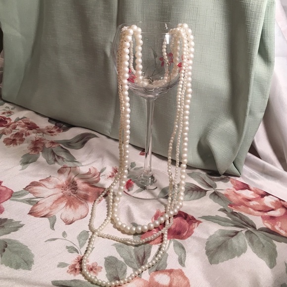 Triple strand of pearls