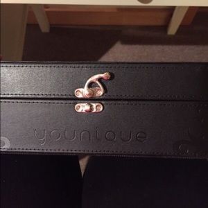 Younique black leather case