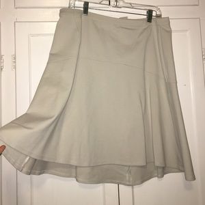 A-line tan flare skirt.