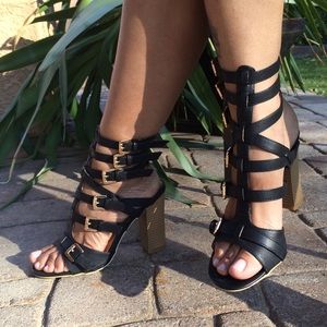 Black Heeled Gladiator Sandals with Gold Buckles