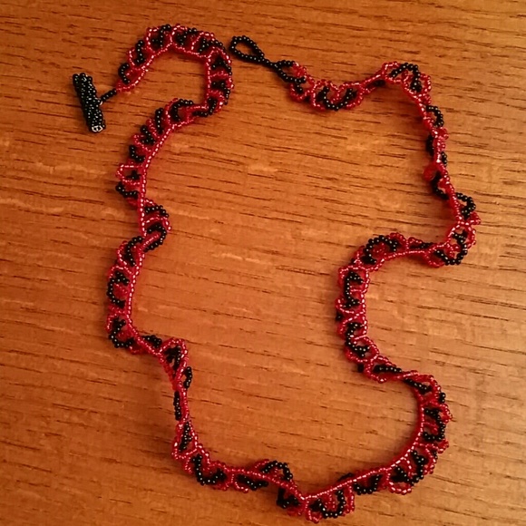 Handmade beaded necklace. Red and black beads.