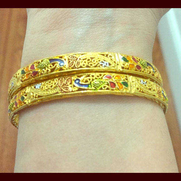 Beautiful peacock bangles in gold