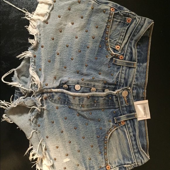 Levi shorts with patches and gold studs
