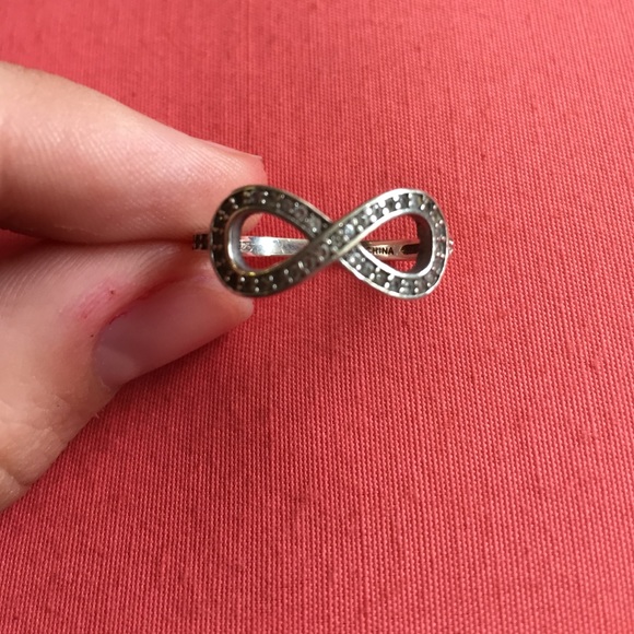 Sterling sliver, cubic zirconium infinity ring.