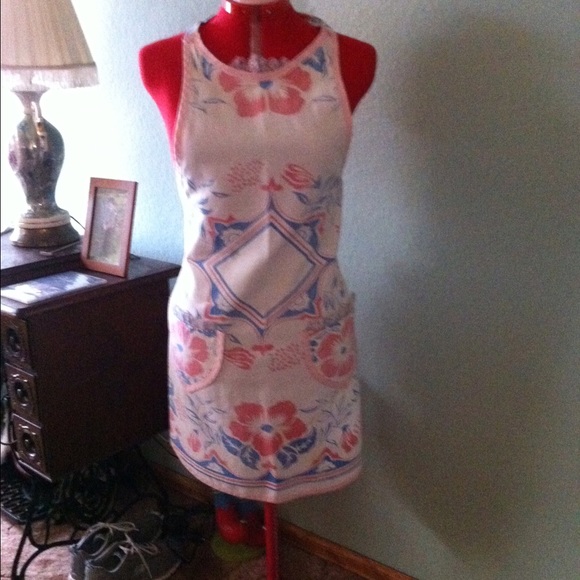 Village table cloth made into an apron