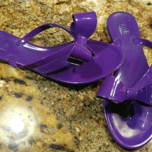 Purple jelly flip flops