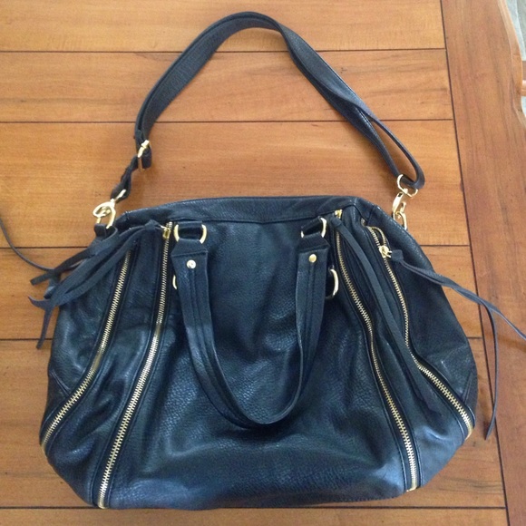 Black faux leather bag with gold zippers. - Picture 2 of 4