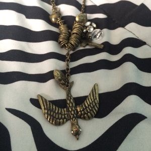 Long chain multi charm necklace