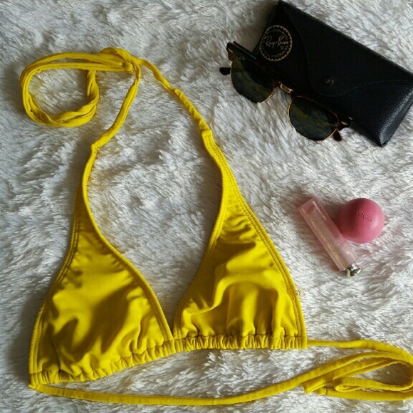 Bright yellow triangle bikini top.