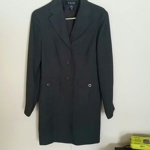 Grey jacket with maroon buttons.