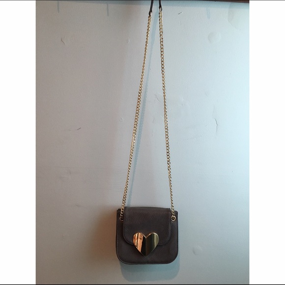 Cooperative cross body bag