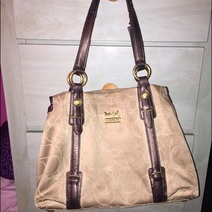 Tan coach purse