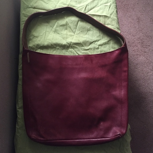 burgundy name brand real leather bag !