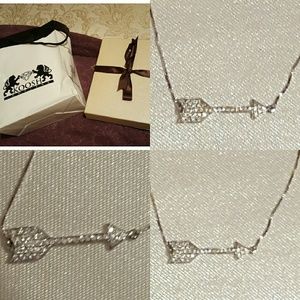 White gold arrow pendant necklace with diamonds