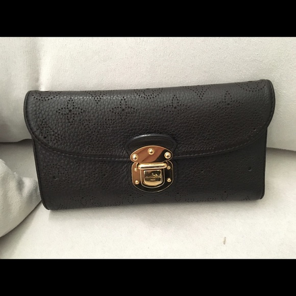 **SOLD* 100% authentic LV in mahina leather