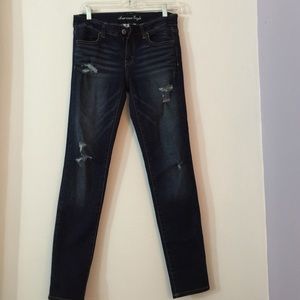 Dark wash ripped skinny jeans