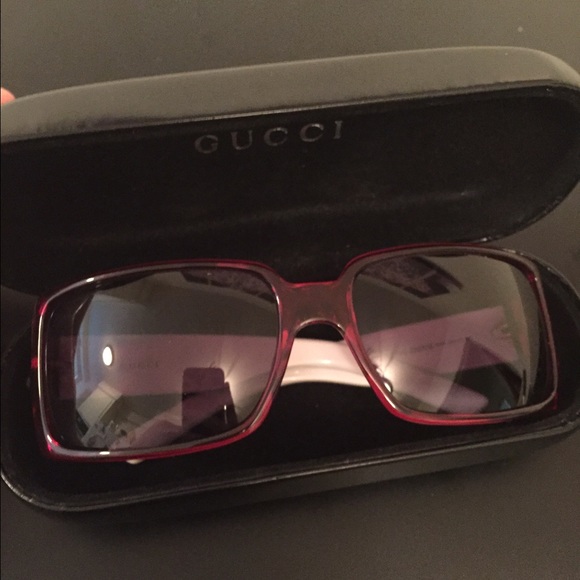 Red and white square Gucci sunglasses.