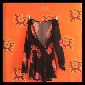 Long-sleeved floral romper