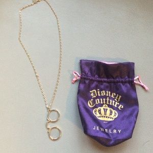 Disney Couture gold necklace.