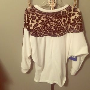 Beautiful and unique leopard and cream sweater.