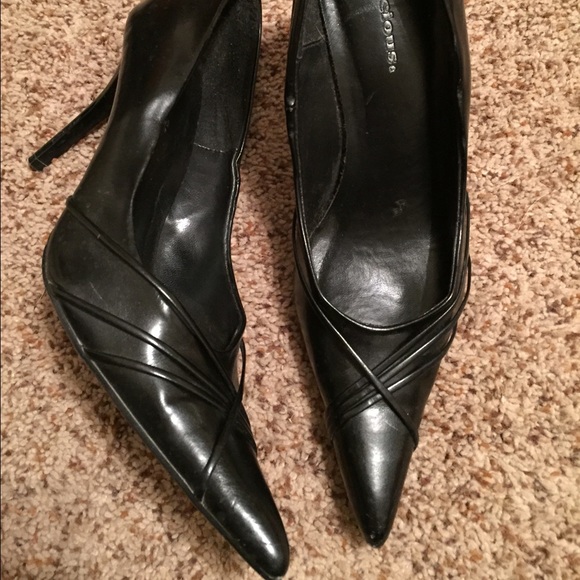 Black pointed toe pumps