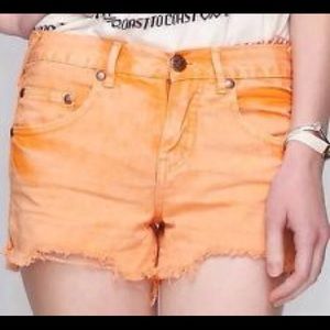Free People shark bite cutoffs