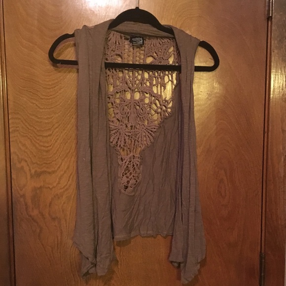 Brown vest with crocheted back