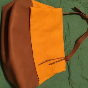 Carlos Santana yellow handbag never used