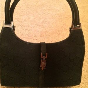 100% Authentic Gucci bag. Some wear.