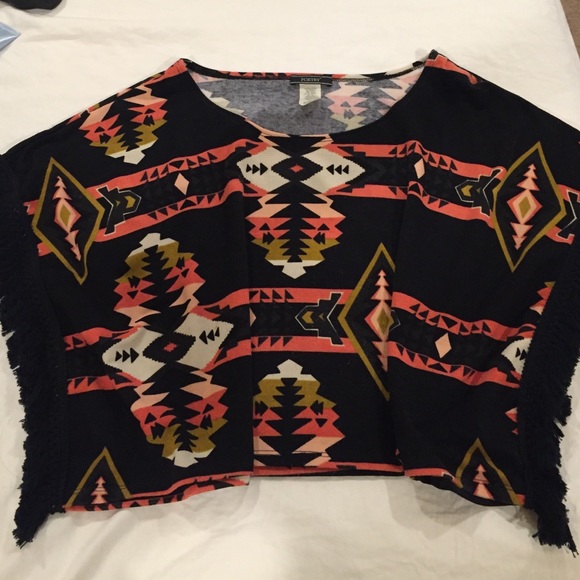 Aztec pancho like top with fringe like sleeves