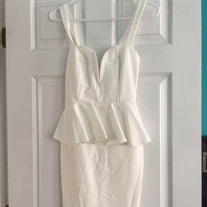 Pep-lum talk ivory midi dress