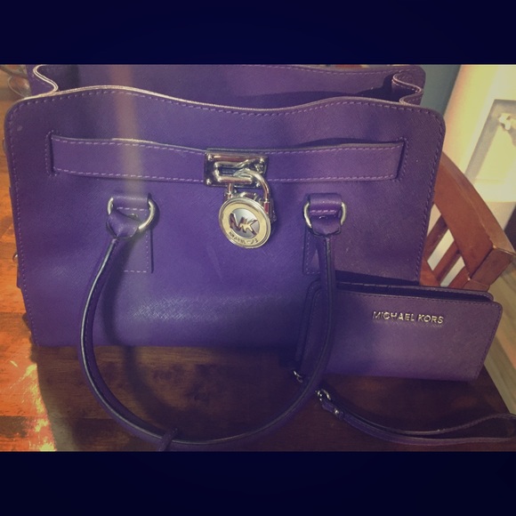 Micheal Kors purple handbag with wallet