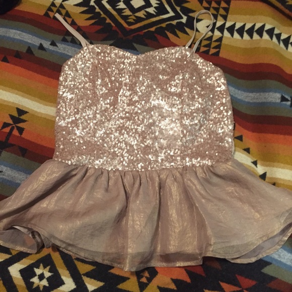 Sequenced peplum top gold sequins