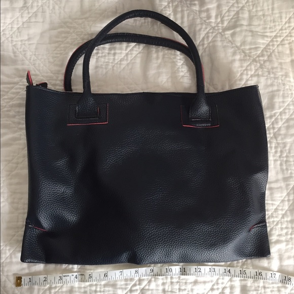 Navy bag with pink accents