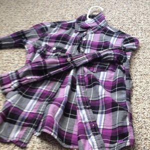 purple plaid shirt.