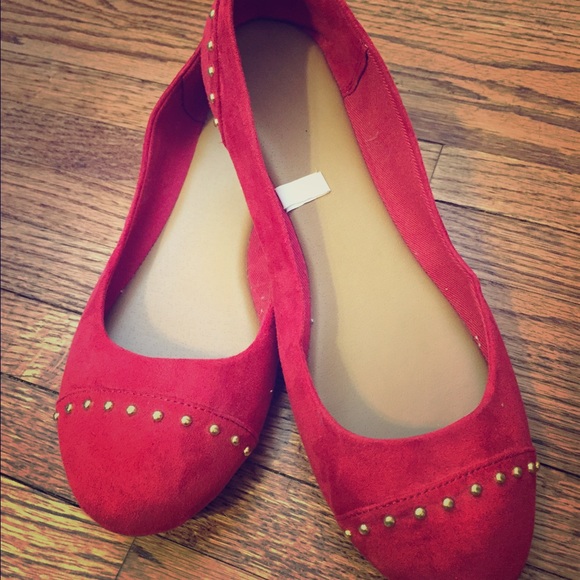 Red flats with gold studs.