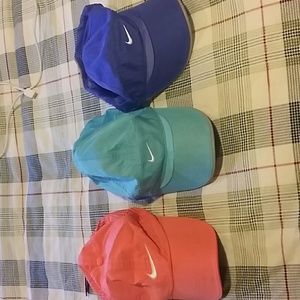 3 Nike colored hats