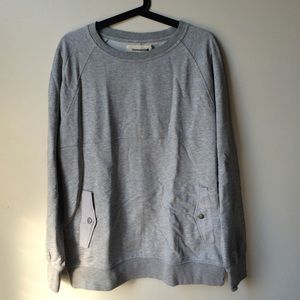 Men's grey crewneck sweatshirt.