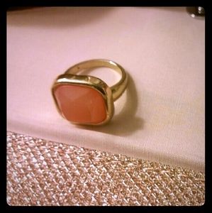 Gold ring with coral stone