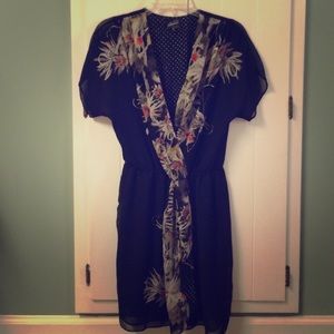 Faux wrap style, tunic or dress. Adorable piece!